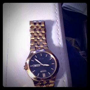A gold citizen watch